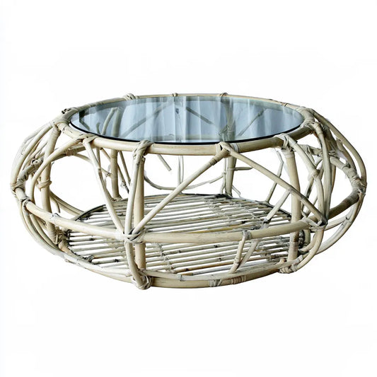 Table basse ronde beige à structure tressée et plateau transparent